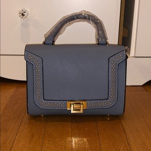 Brand new small blue bag